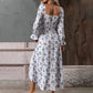 Elegantes, bedrucktes Kleid mit langen Ärmeln und Schlitz für Damen