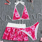 3-teiliges Bikini-Set mit Blumenmuster und Neckholder sowie Rüschenrock
